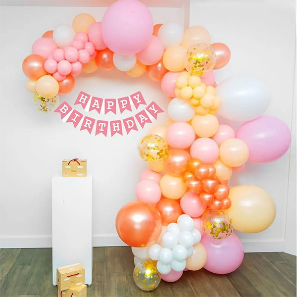Pastel Peach Balloon Arch Setup